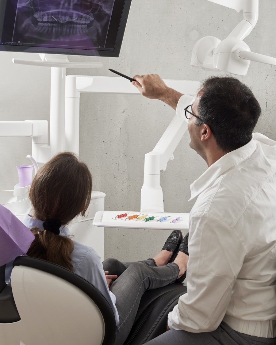 Dentist explaining dental imaging to a patient